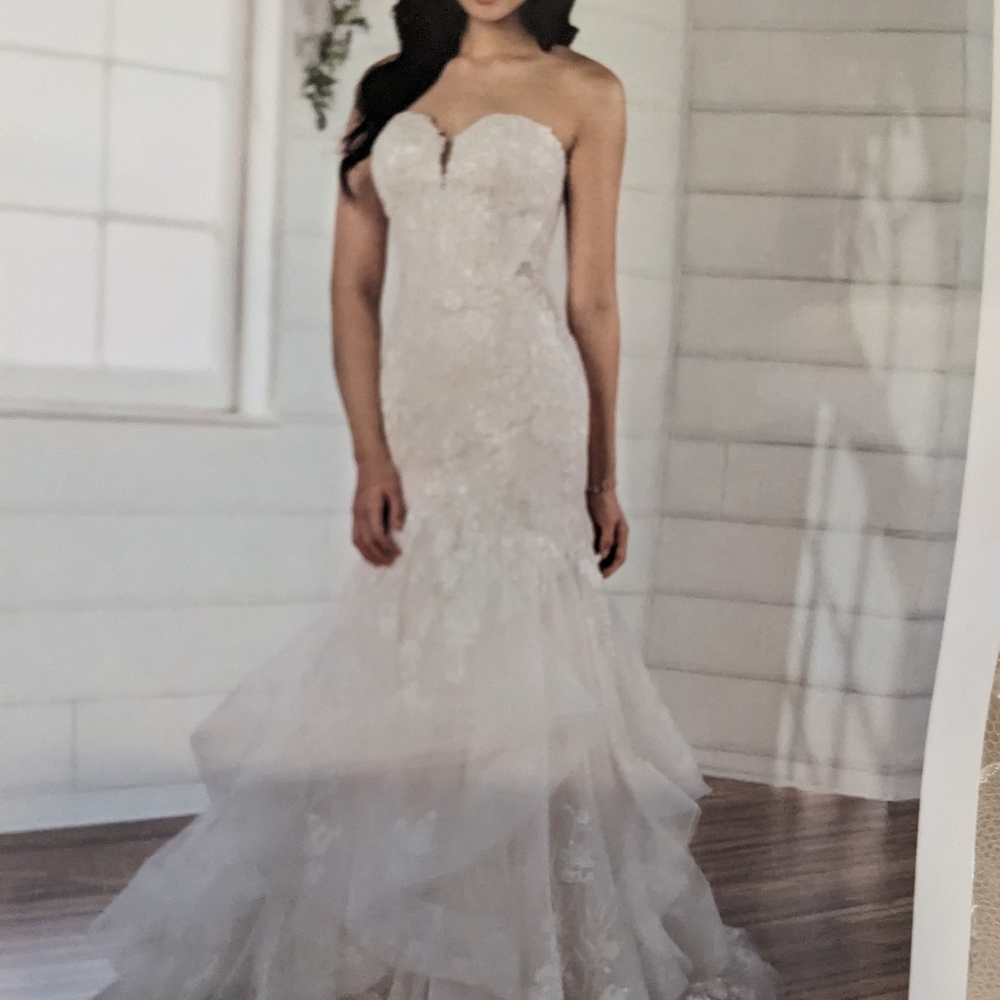 Wedding dress by Essence of Australia